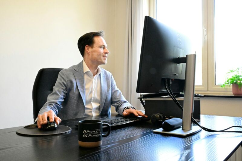 A man working at a computer desk