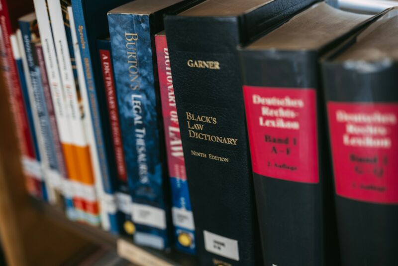 Law books lined up on a shelf